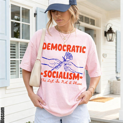 Pink t-shirt with &amp;quot;Democratic Socialism&amp;quot; and rose graphic, &amp;quot;The Left Is Not A Phase.&amp;quot;