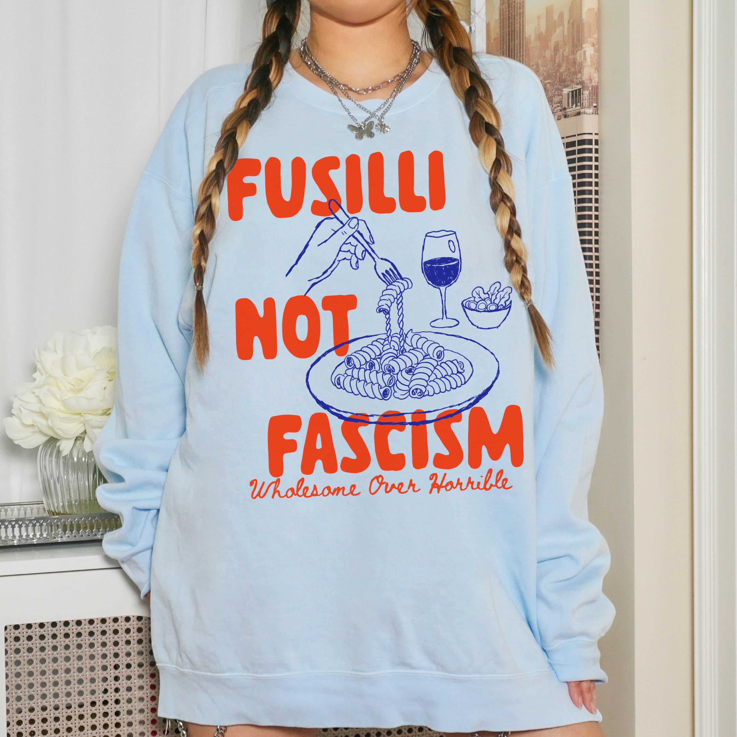Light blue sweatshirt with &amp;quot;Fusilli Not Fascism&amp;quot; text and pasta graphic.