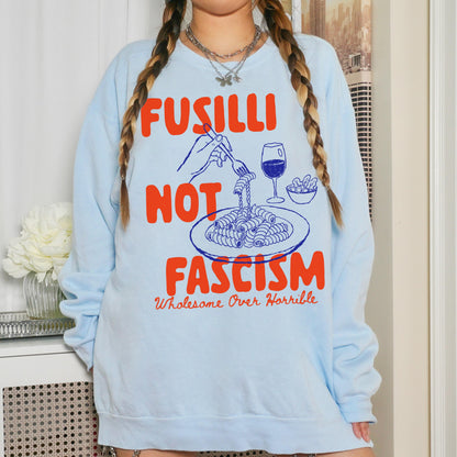Light blue sweatshirt with &amp;quot;Fusilli Not Fascism&amp;quot; text and pasta graphic.