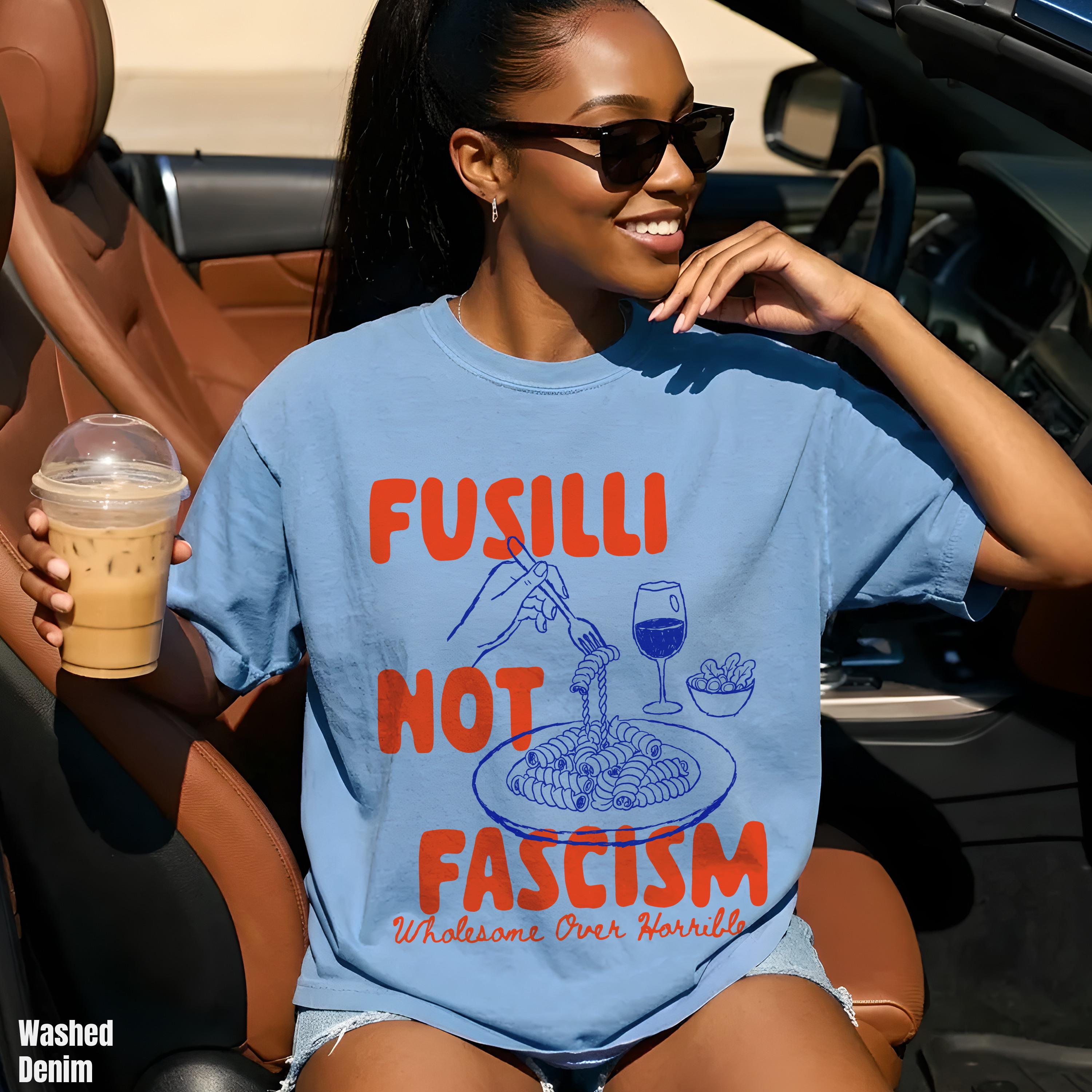 Light blue t-shirt with text &amp;quot;FUSILLI NOT FASCISM&amp;quot; and a pasta graphic.