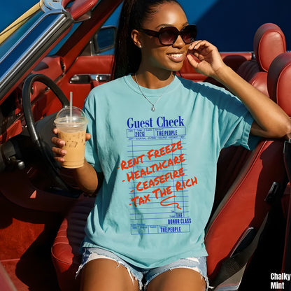 Teal graphic t-shirt with &amp;quot;Guest Check&amp;quot; design, &amp;quot;Rent Freeze&amp;quot;, &amp;quot;Healthcare&amp;quot;, &amp;quot;Ceasefire&amp;quot;, &amp;quot;Tax The Rich&amp;quot; slogans.