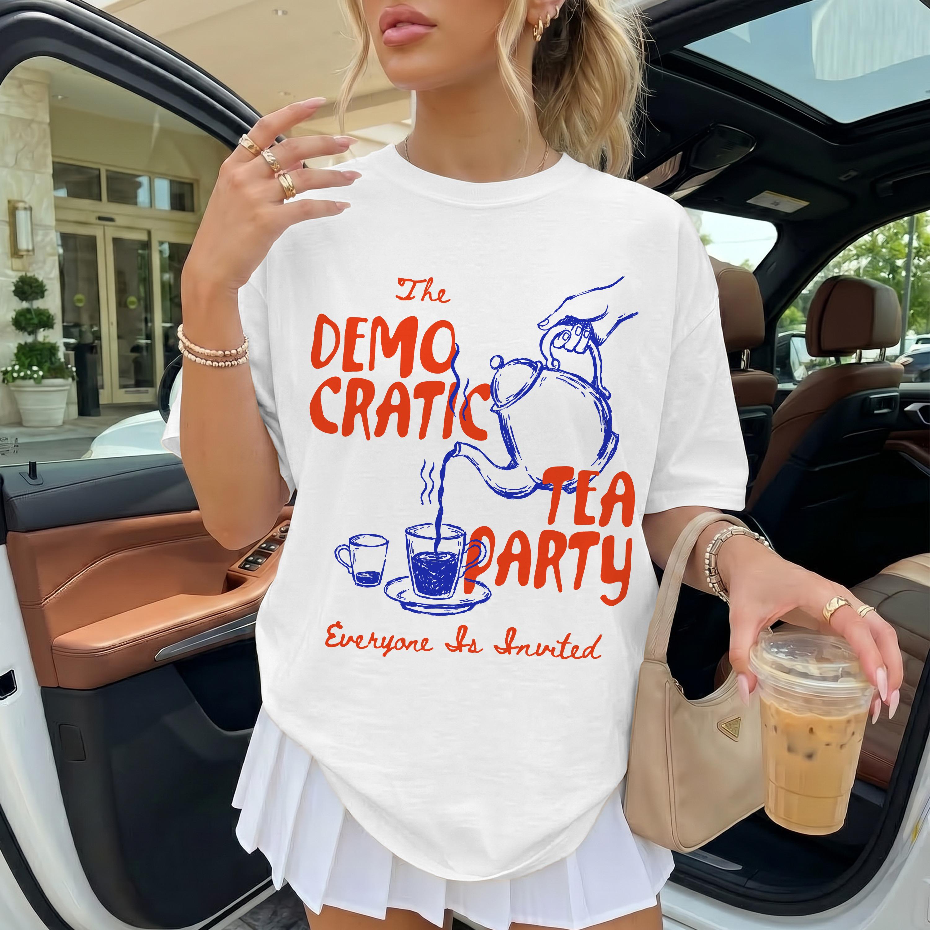 White t-shirt with &amp;quot;The Democratic Tea Party&amp;quot; text and tea pouring illustration.