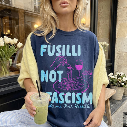 Navy t-shirt with &amp;quot;Fusilli Not Fascism Wholesome Over Horrible&amp;quot; graphic.
