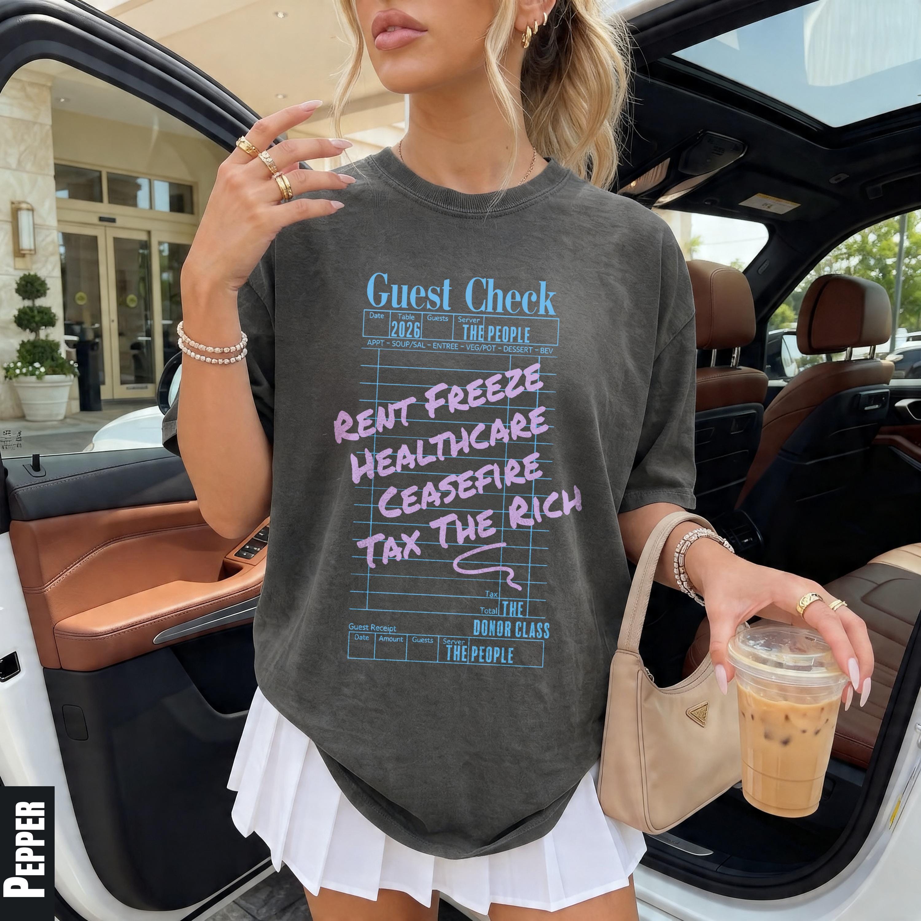 &amp;quot;Guest Check&amp;quot; t-shirt with &amp;quot;Rent Freeze, Healthcare, Ceasefire, Tax The Rich&amp;quot; text.