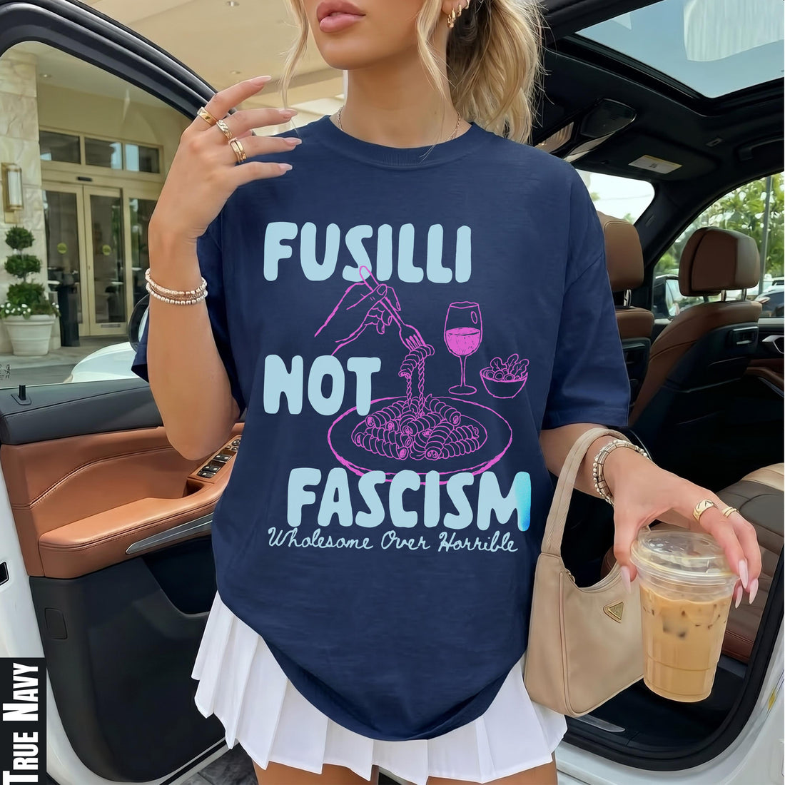 Navy t-shirt with text &amp;quot;Fusilli Not Fascism Wholesome Over Horrible&amp;quot; and pasta graphic.