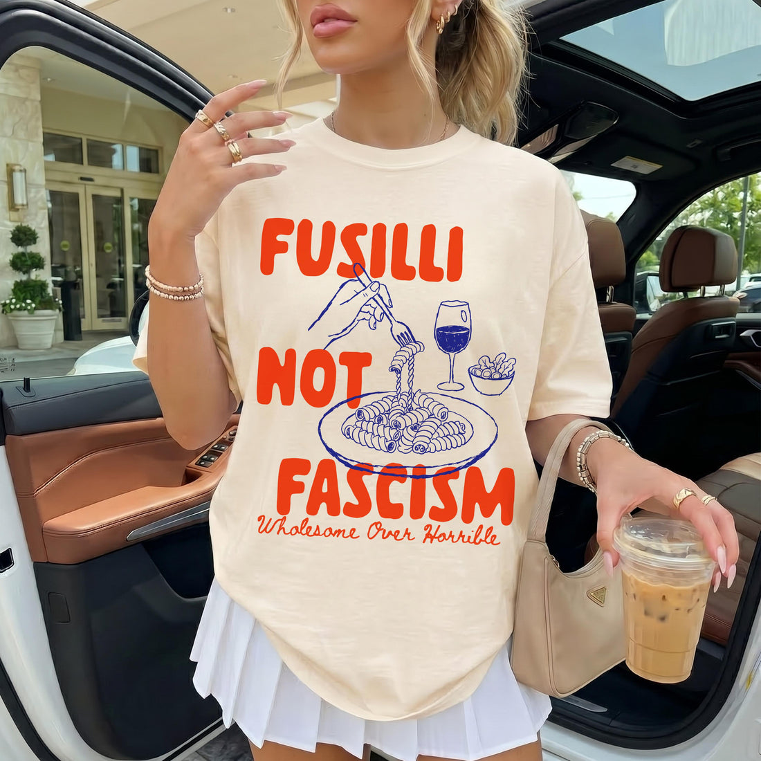 Cream t-shirt with &amp;quot;Fusilli Not Fascism&amp;quot; and pasta graphics.