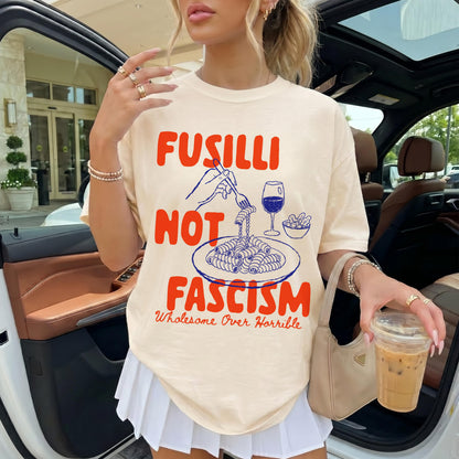 Cream t-shirt with &amp;quot;Fusilli Not Fascism&amp;quot; and pasta graphics.