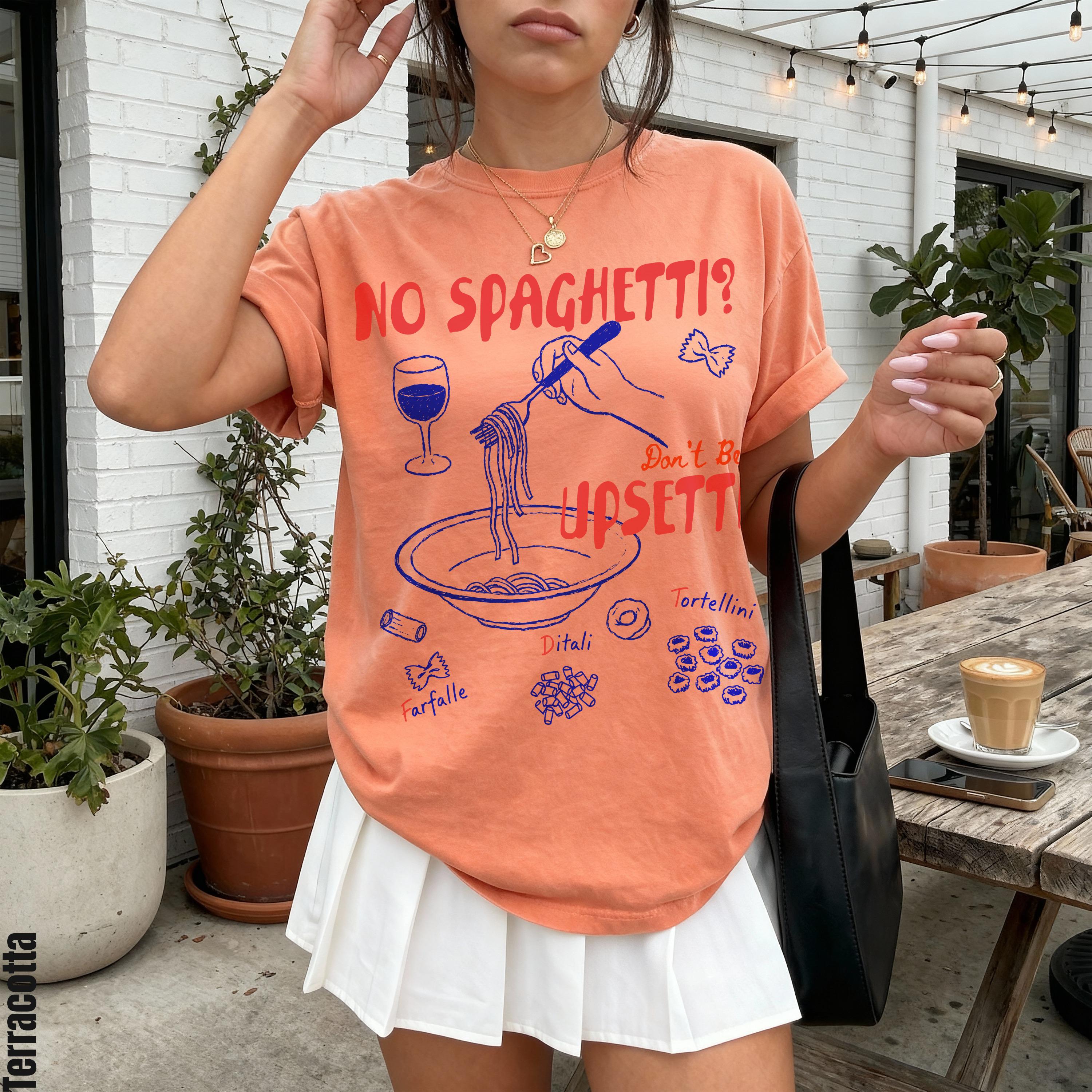 Peach t-shirt with &amp;quot;NO SPAGHETTI?&amp;quot; graphic and pasta illustrations.
