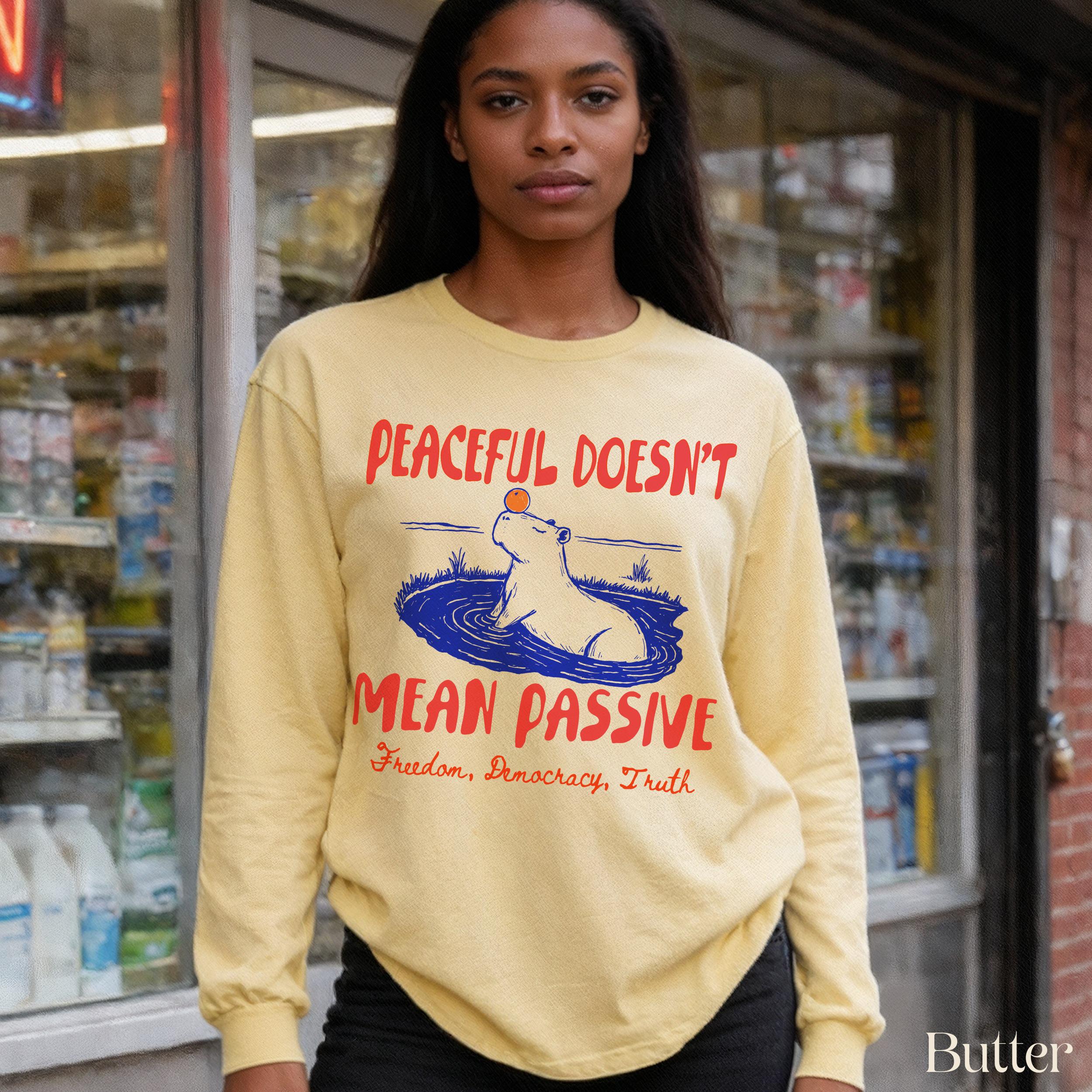 Yellow long sleeve shirt with &amp;quot;Peaceful Doesn&amp;