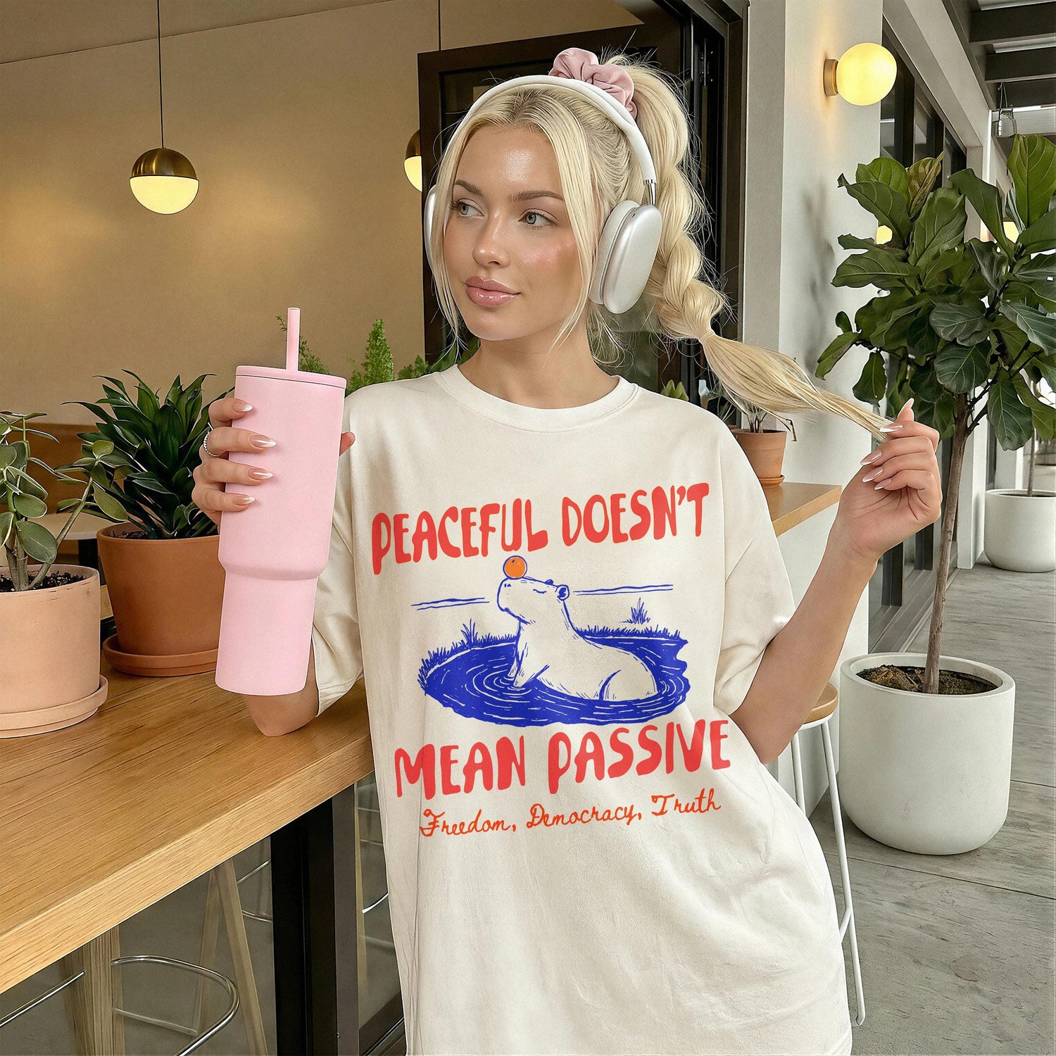 Cream t-shirt with &amp;quot;Peaceful Doesn&amp;