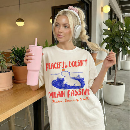 Cream t-shirt with &amp;quot;Peaceful Doesn&amp;