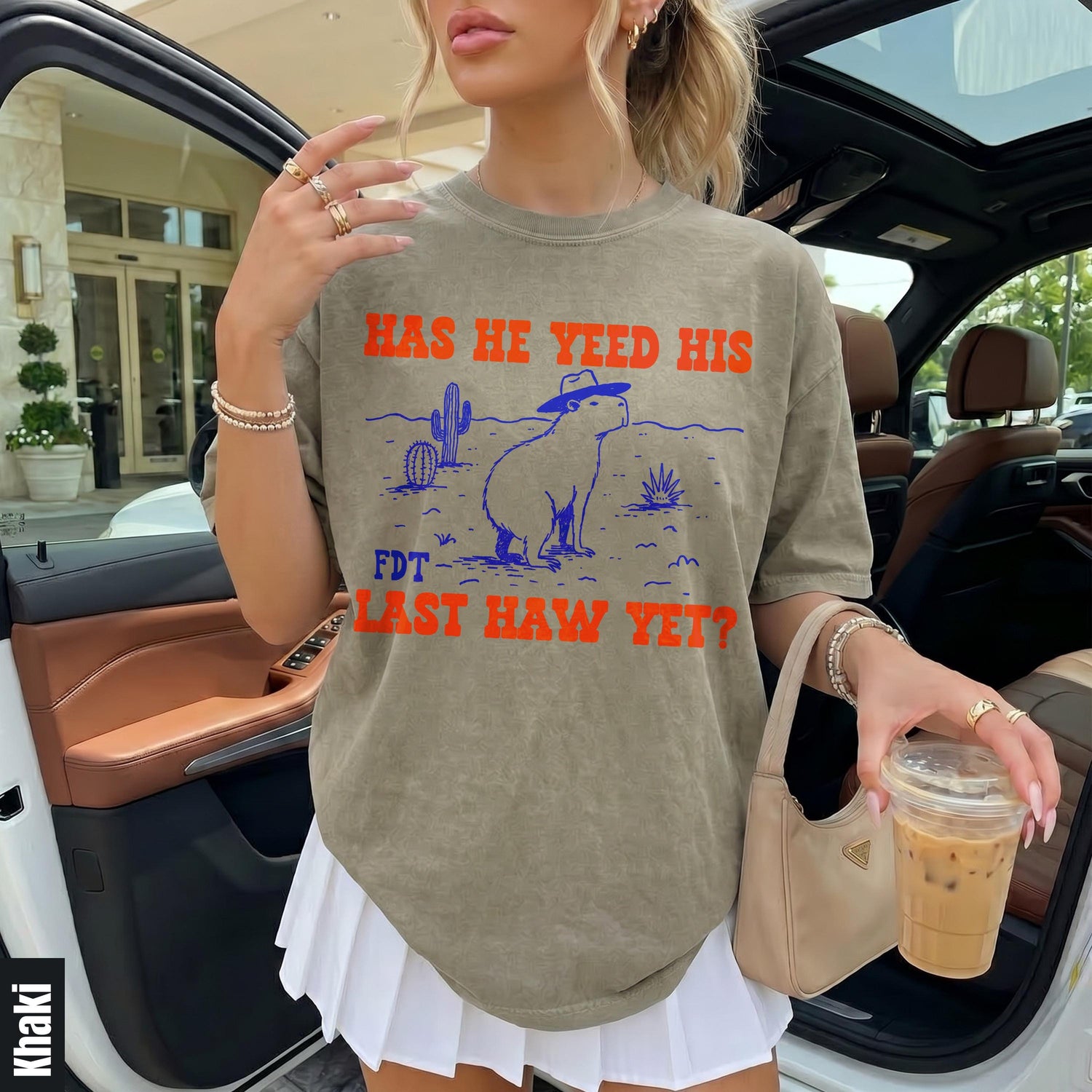 T-shirt with capybara in cowboy hat, cactus, and desert scene, text &amp;quot;HAS HE YEED HIS FDT LAST HAW YET?&amp;quot;