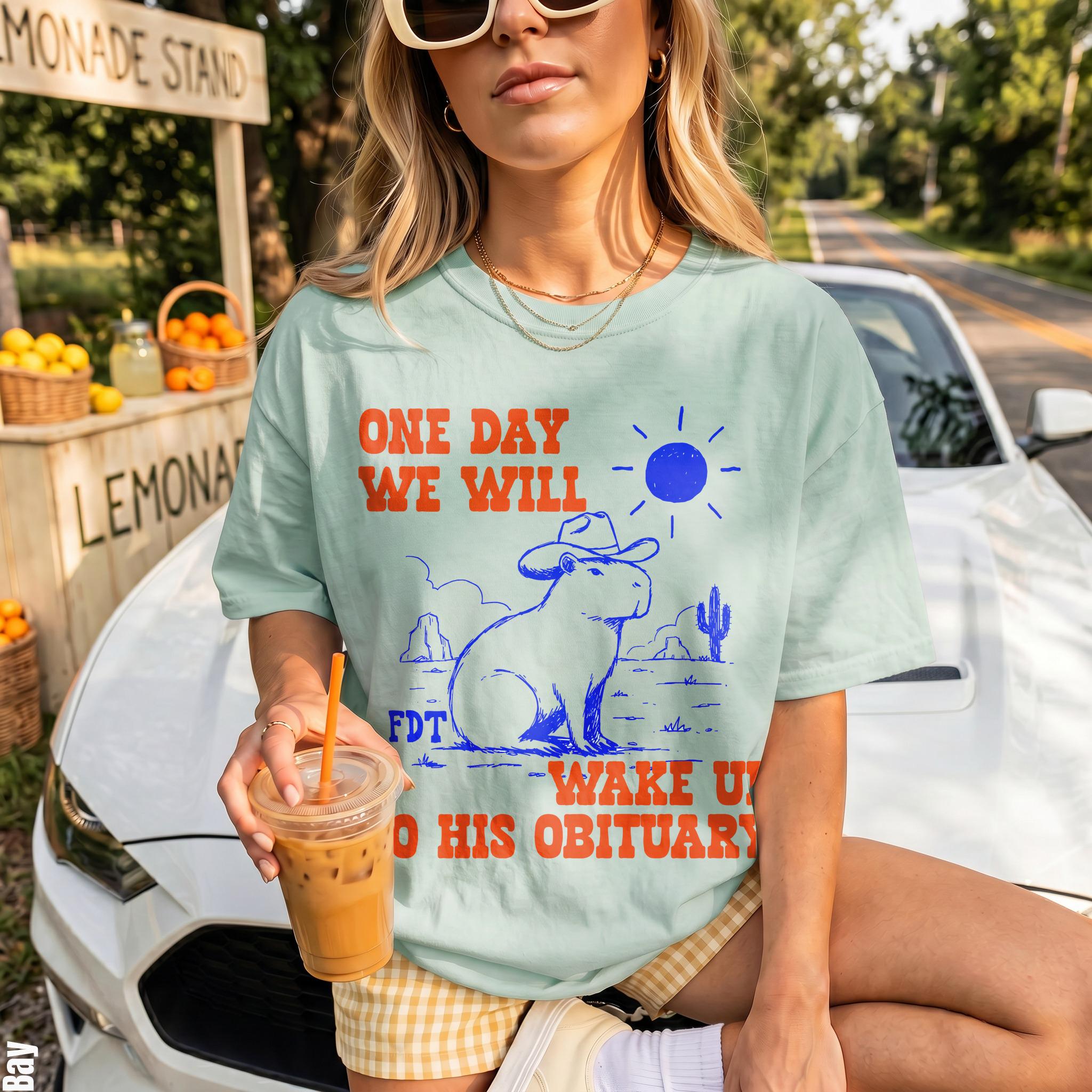 Mint t-shirt with &amp;quot;One day we will wake up to his obituary&amp;quot; graphic.