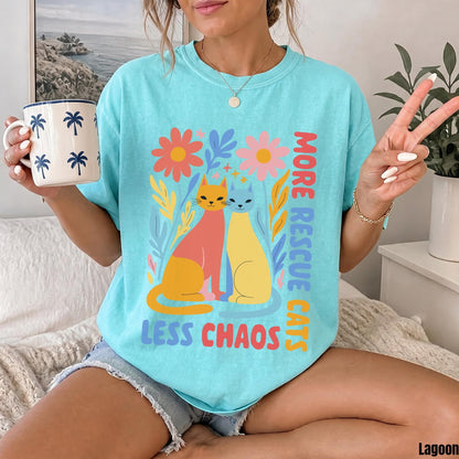 Two cats, pink and yellow, with text &amp;quot;MORE RESCUE CATS LESS CHAOS&amp;quot;.