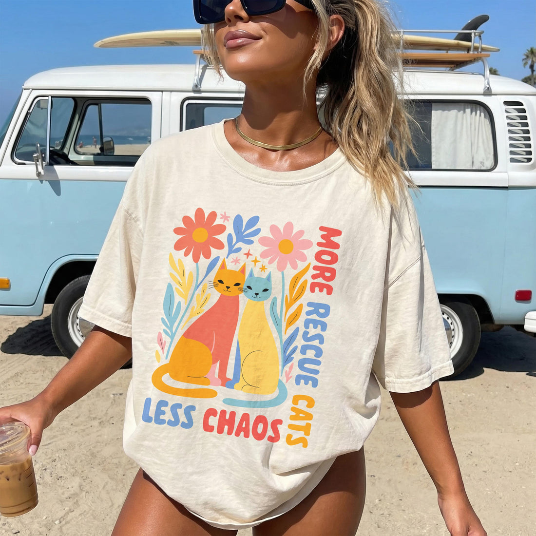 T-shirt with cats, flowers, and text &amp;quot;MORE RESCUE LESS CHAOS&amp;quot;