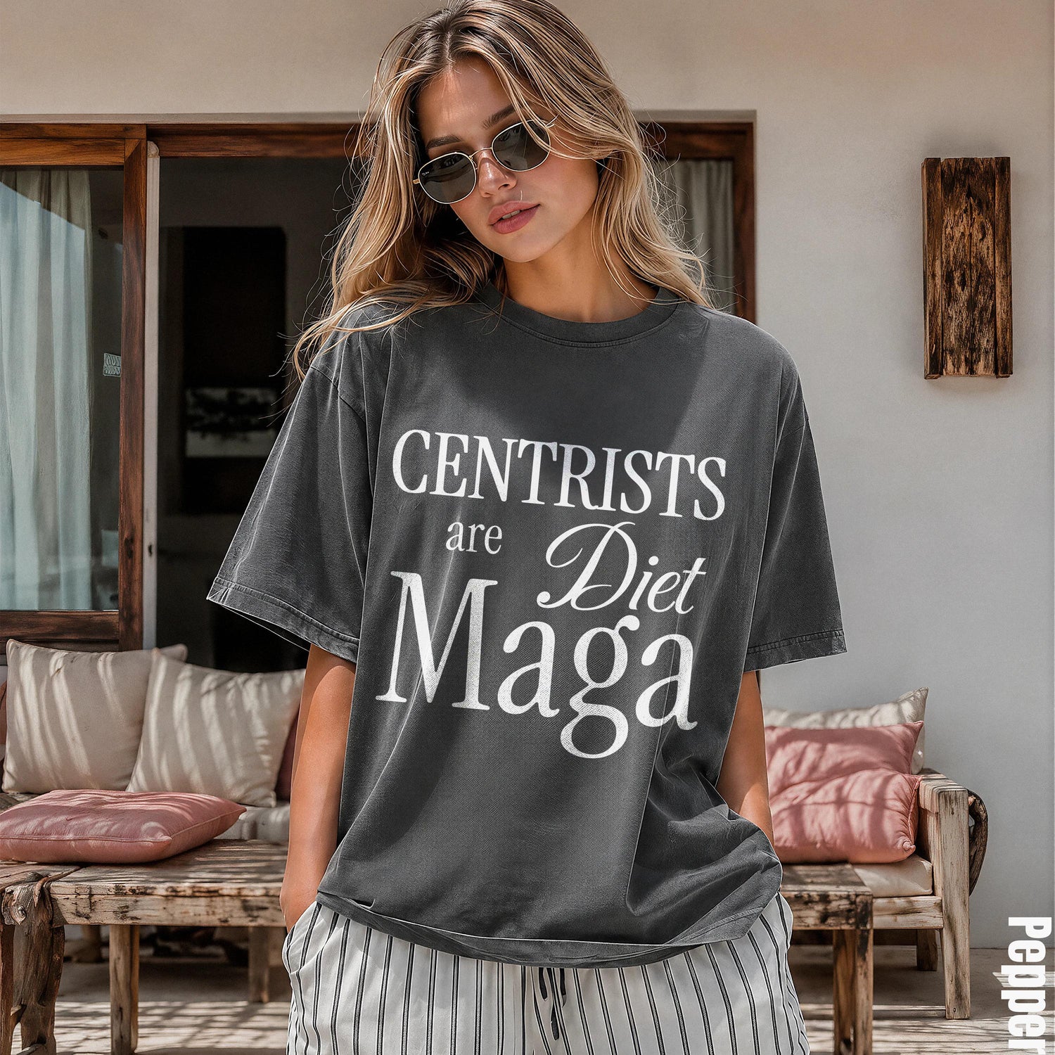 Dark grey t-shirt with white text &amp;quot;Centrists are Diet Maga&amp;quot; worn by a woman.