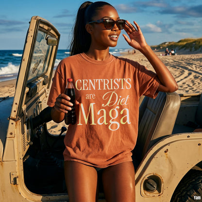 Woman in orange t-shirt with text &amp;quot;Centrists are Diet Maga&amp;quot; holding a drink at the beach.