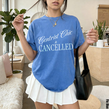 Blue t-shirt with &amp;quot;Centrist Chic is CANCELLED&amp;quot; text, worn by a woman.