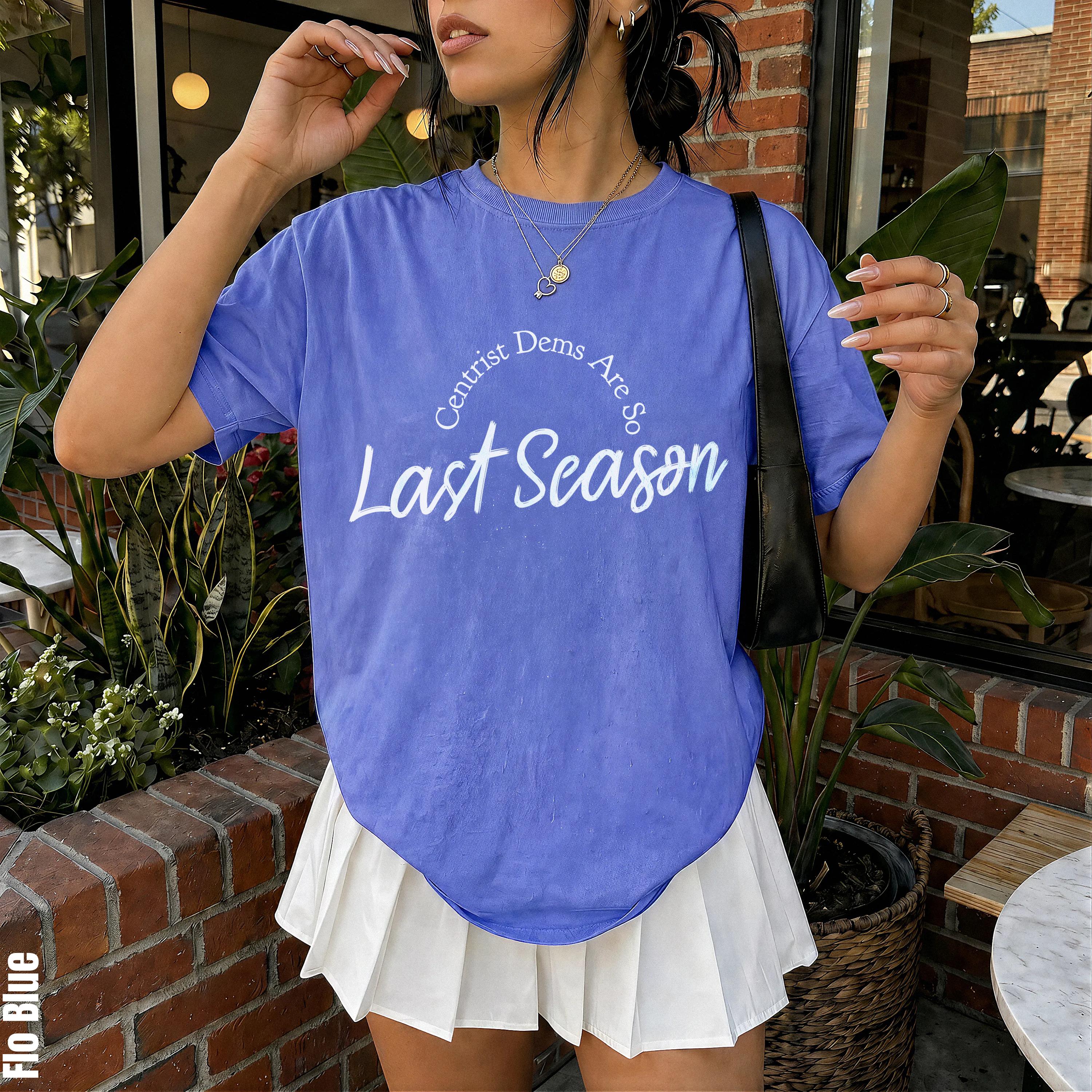 Blue t-shirt with &amp;quot;Centrist Dems Are So Last Season&amp;quot; text and a white pleated skirt.