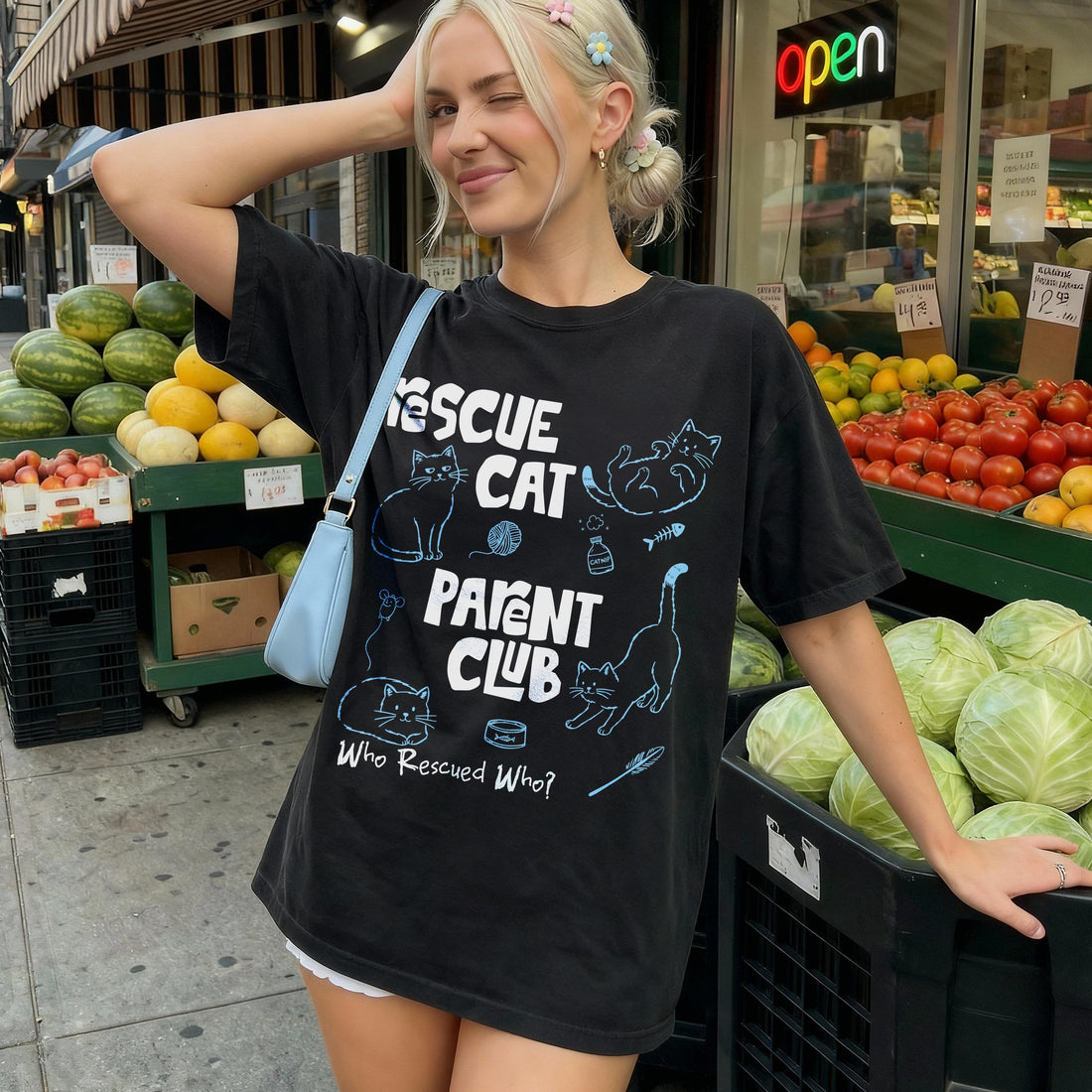 Black t-shirt with &amp;quot;Rescue Cat Parent Club&amp;quot; text and cat graphics.