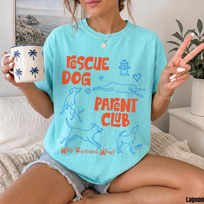 Turquoise t-shirt with &amp;quot;Rescue Dog Parent Club&amp;quot; and dog graphics.