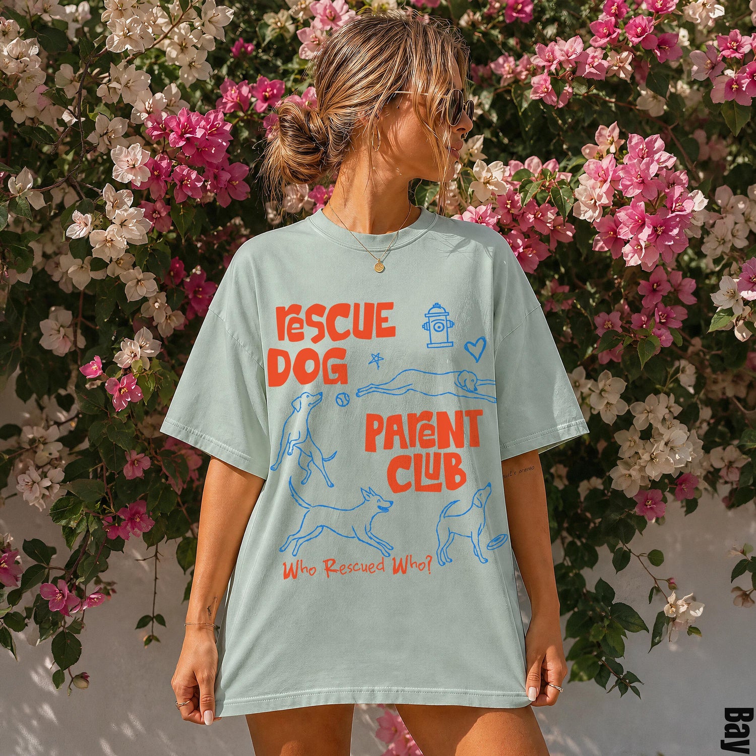 Light blue t-shirt with &amp;quot;RESCUE DOG PARENT CLUB&amp;quot; and dog graphics.