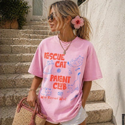 Pink t-shirt with &amp;quot;Rescue Cat, Parent Club&amp;quot; text and cat illustrations.