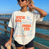 Cream t-shirt with "Rescue Dog Parent Club" text and dog illustrations.