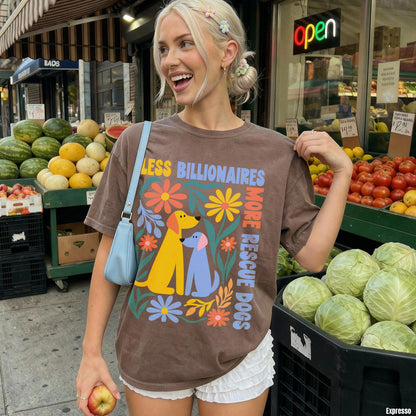 Woman in brown t-shirt with dogs and text &amp;quot;Less Billionaires, More Rescue Dogs&amp;quot;.