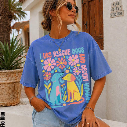 Blue t-shirt with colorful dog graphic and &amp;quot;I LIKE RESCUE DOGS AND DECENT HUMANS&amp;quot; text.