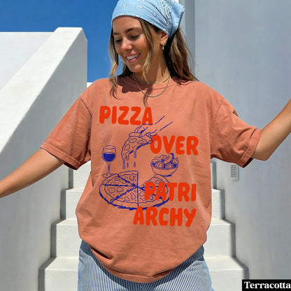Terracotta t-shirt with orange text and blue pizza graphic.