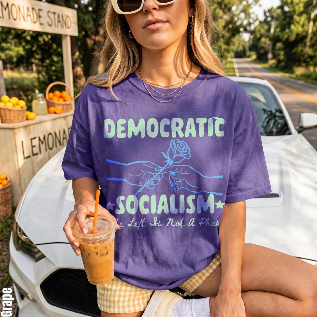 Purple t-shirt with &amp;quot;Democratic Socialism&amp;quot; text, illustration, and small text below.