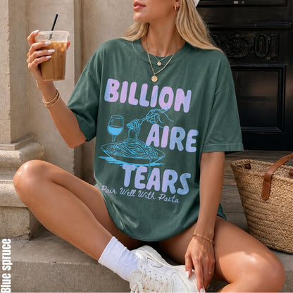 Green t-shirt with &amp;quot;Billionaire Tears Pair Well With Pasta&amp;quot; graphic.
