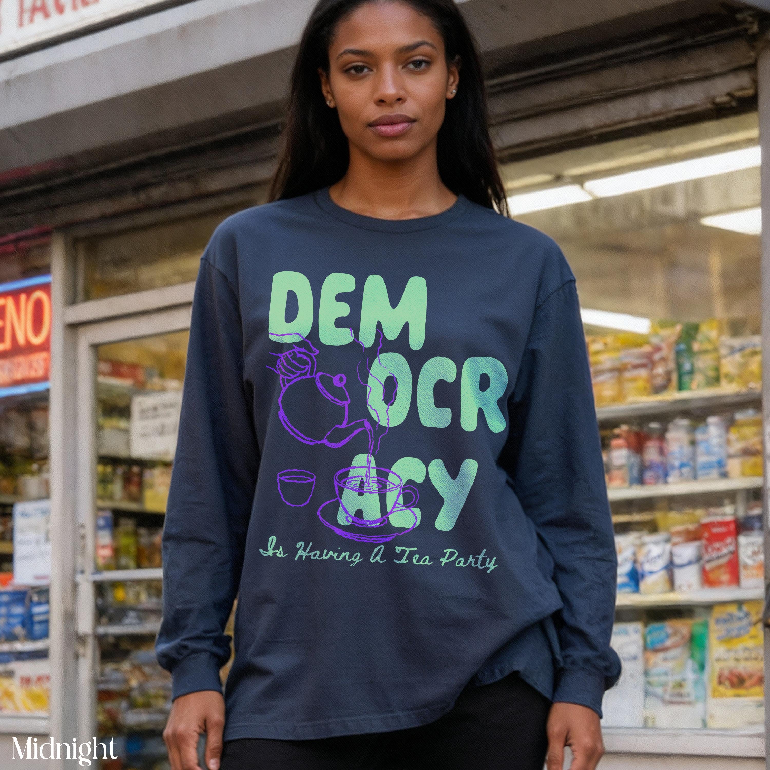 Dark blue long-sleeve shirt with &amp;quot;DEM OCRACY Is Having A Tea Party&amp;quot; text and tea illustration.