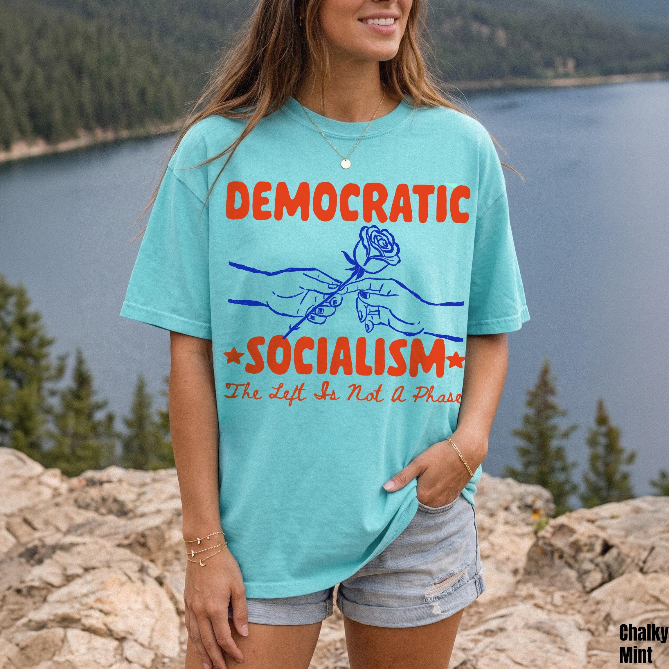 Teal t-shirt with &amp;quot;DEMOCRATIC SOCIALISM The Left Is Not A Phase&amp;quot; graphic in red and blue.