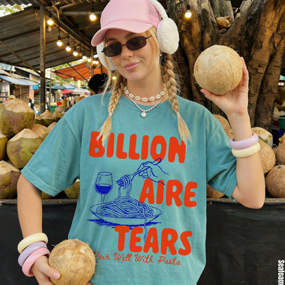 Teal t-shirt with &amp;quot;BillionAIRE TEARS Pair Well With Pasta&amp;quot; text and graphics.
