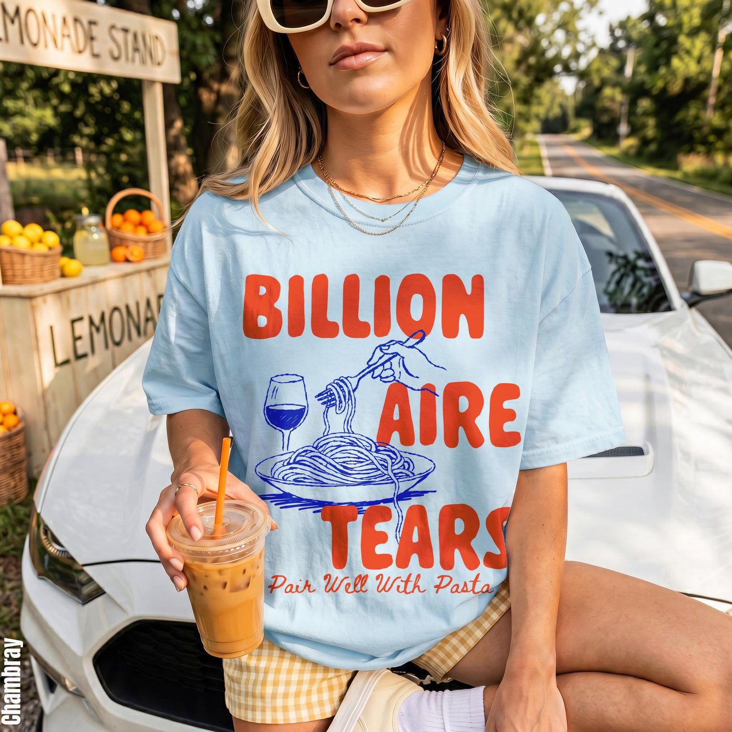 Light blue t-shirt with &amp;quot;BILLIONAIRE TEARS Pair Well With Pasta&amp;quot; text and graphic.