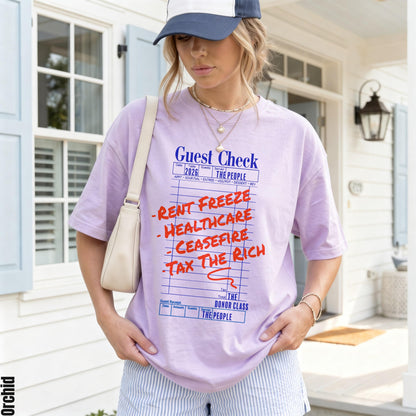 Light purple t-shirt with &amp;quot;Guest Check&amp;quot; text and &amp;quot;Rent Freeze Healthcare Ceasefire Tax The Rich&amp;quot; list.