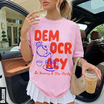 Pink t-shirt with red &amp;quot;DEMOCRACY is Having A Tea Party&amp;quot; graphic.