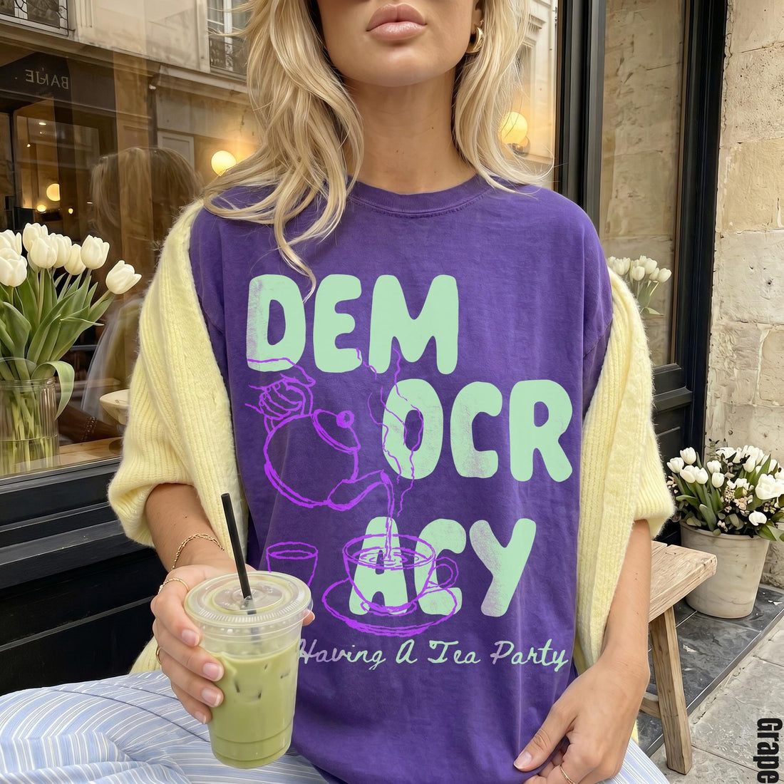 Purple t-shirt with &amp;quot;DEMOCRACY Having A Tea Party&amp;quot; text and graphic.