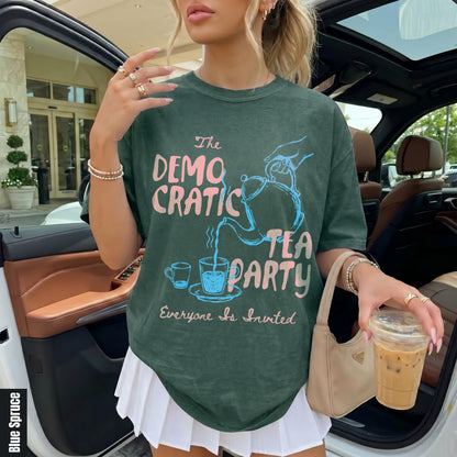 Green t-shirt with pink and blue text that reads &amp;quot;The Democratic Tea Party Everyone Is Invited.&amp;quot;