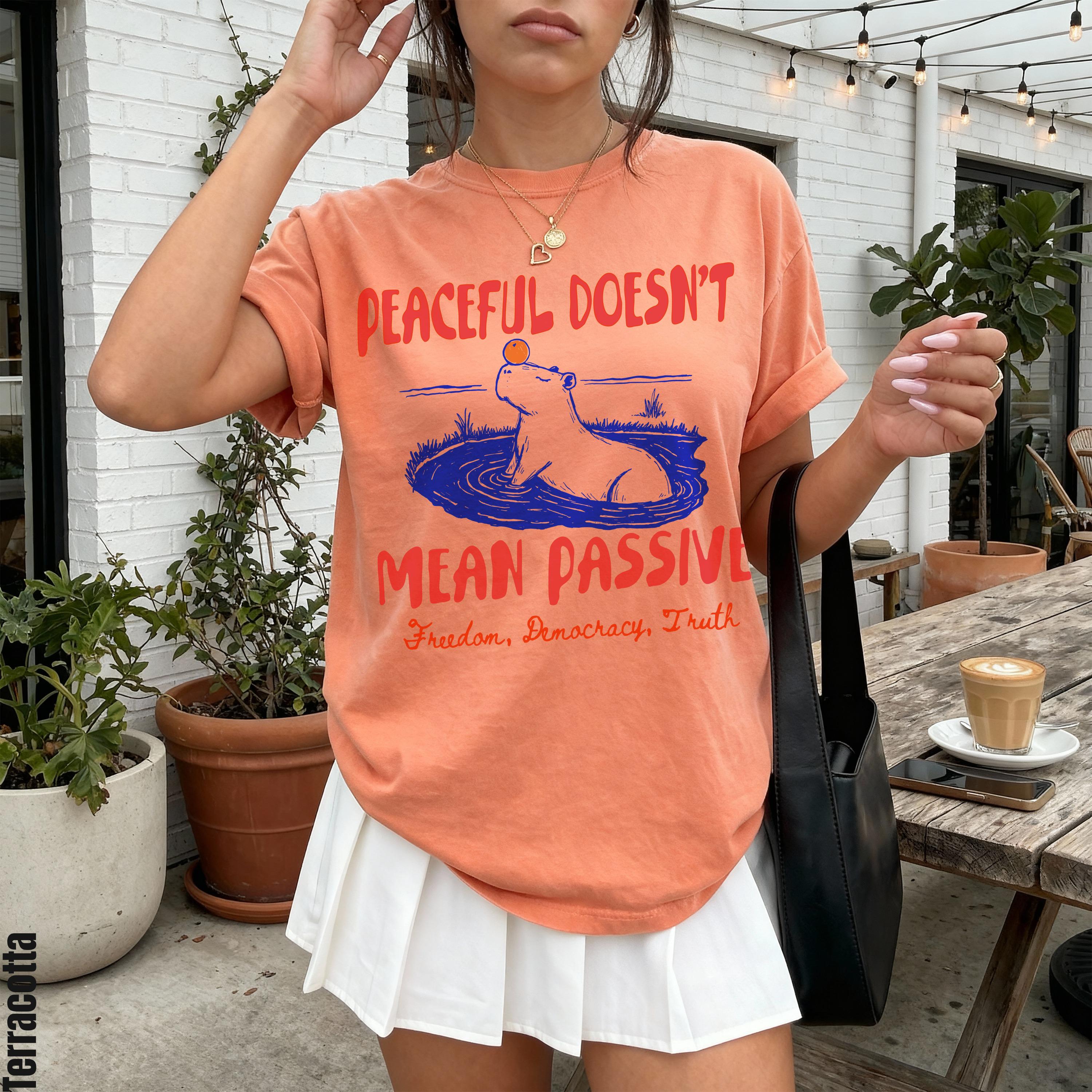 Orange t-shirt with &amp;quot;Peaceful Doesn&amp;