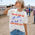 White t-shirt with blue and red graphic and text "HAS HE YEED HIS FDT LAST HAW YET?".