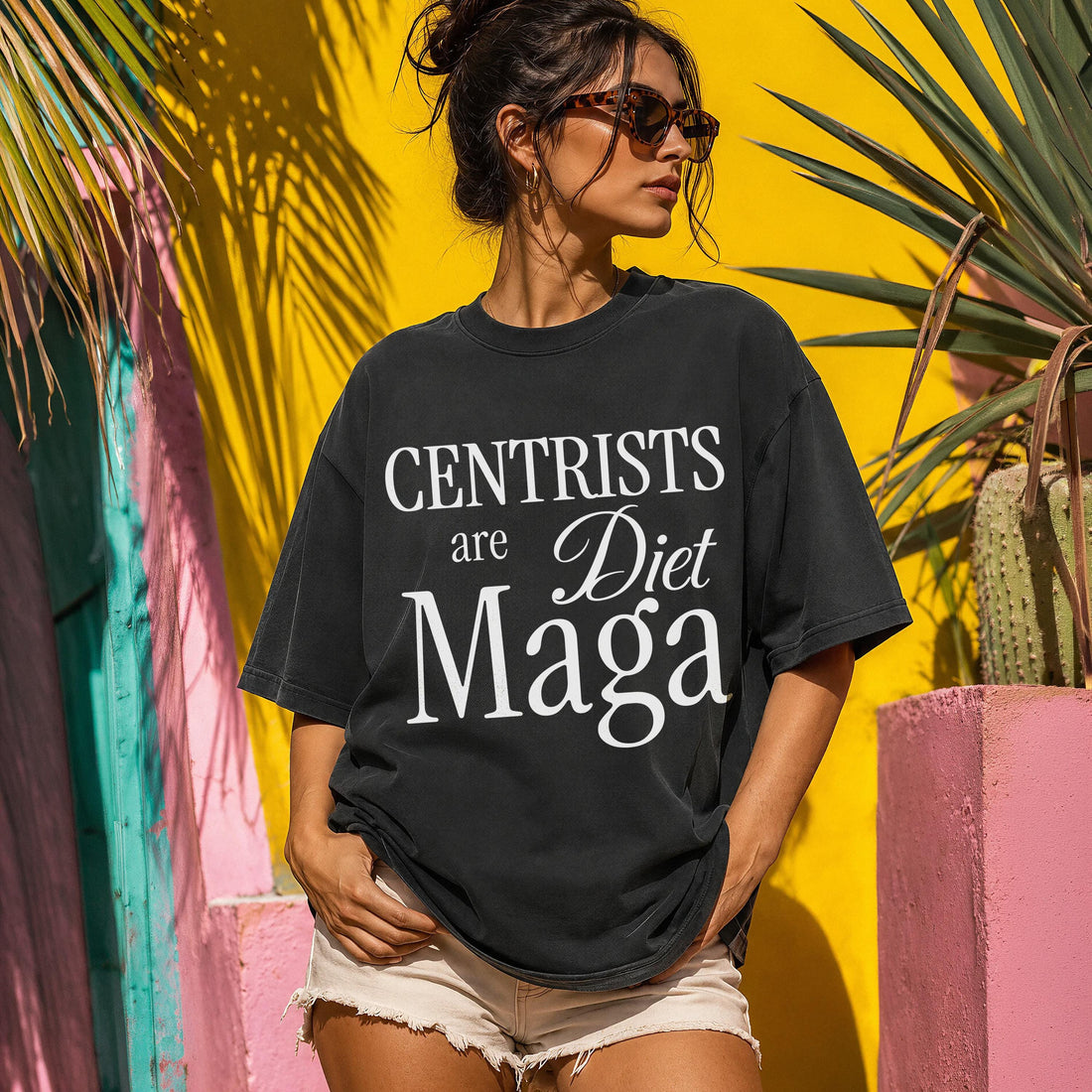 Black t-shirt with white text &amp;quot;CENTURISTS are Diet Manga&amp;quot; against a colorful wall.