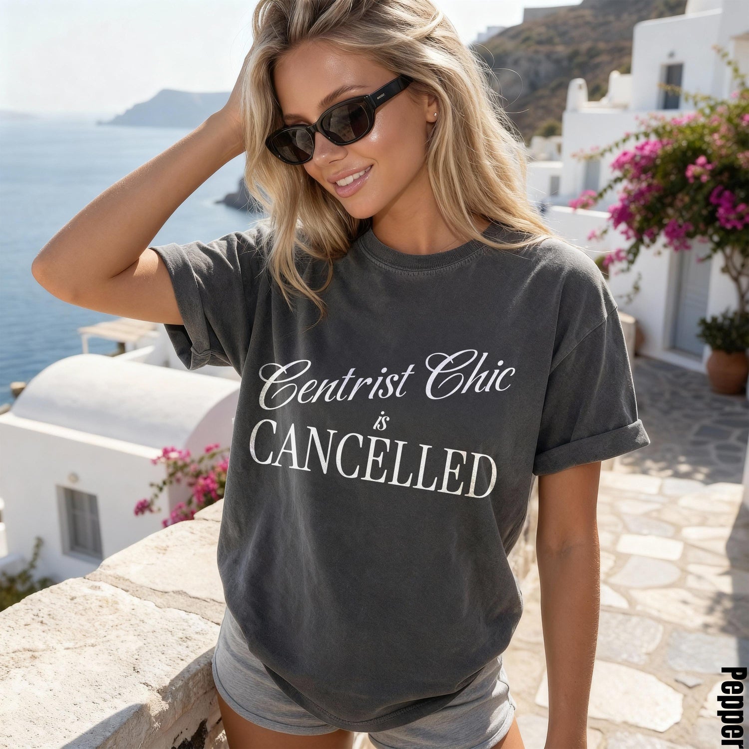 Woman wearing gray t-shirt that says &amp;quot;Centrist Chic is CANCELLED&amp;quot;