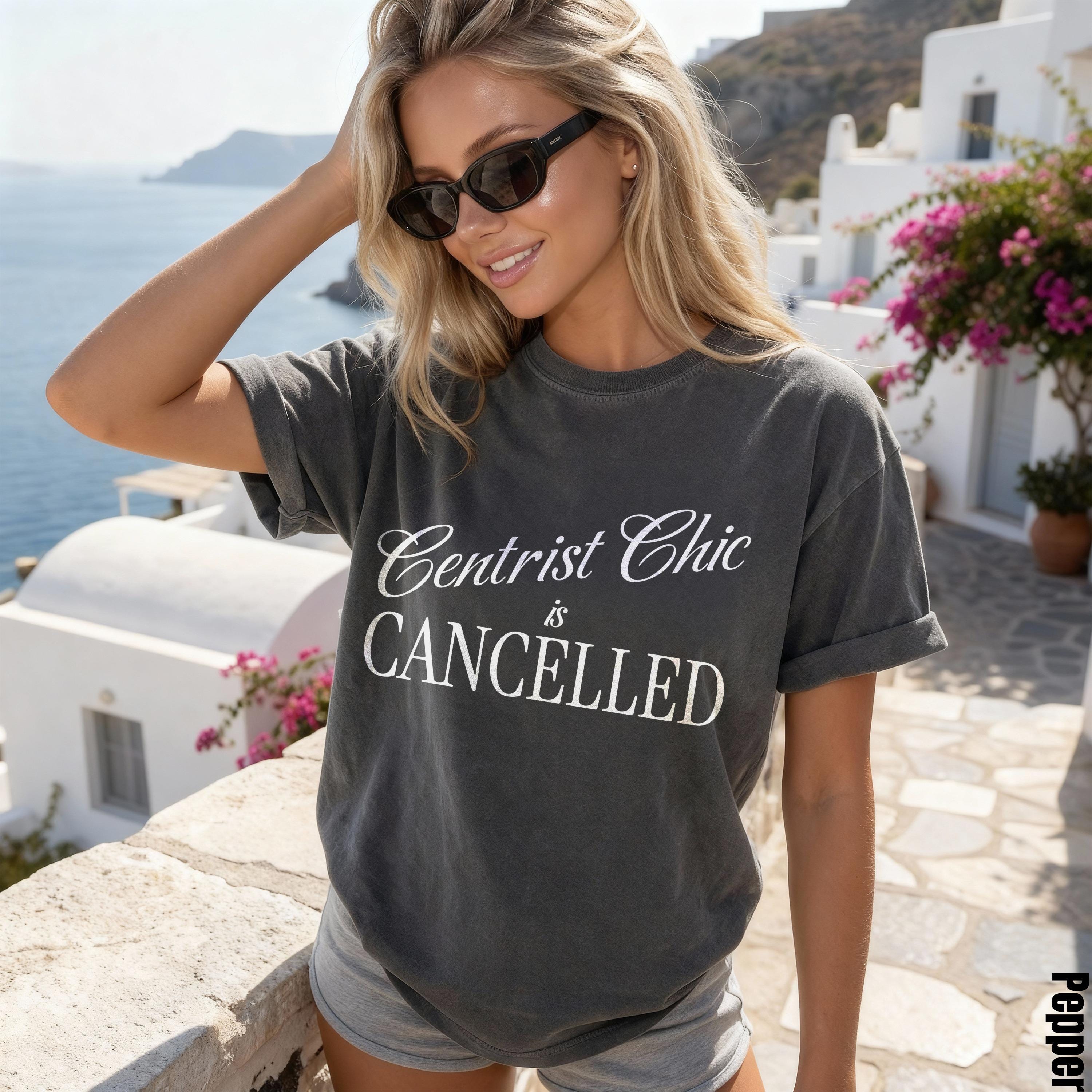 Woman wearing gray t-shirt that says &amp;quot;Centrist Chic is CANCELLED&amp;quot;