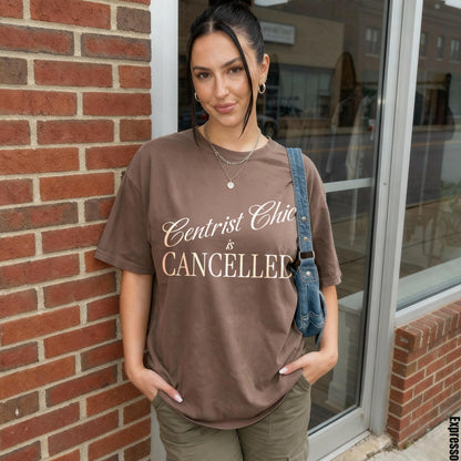 Brown t-shirt with &amp;quot;Centrist Chic is CANCELLED&amp;quot; text, worn by a woman.