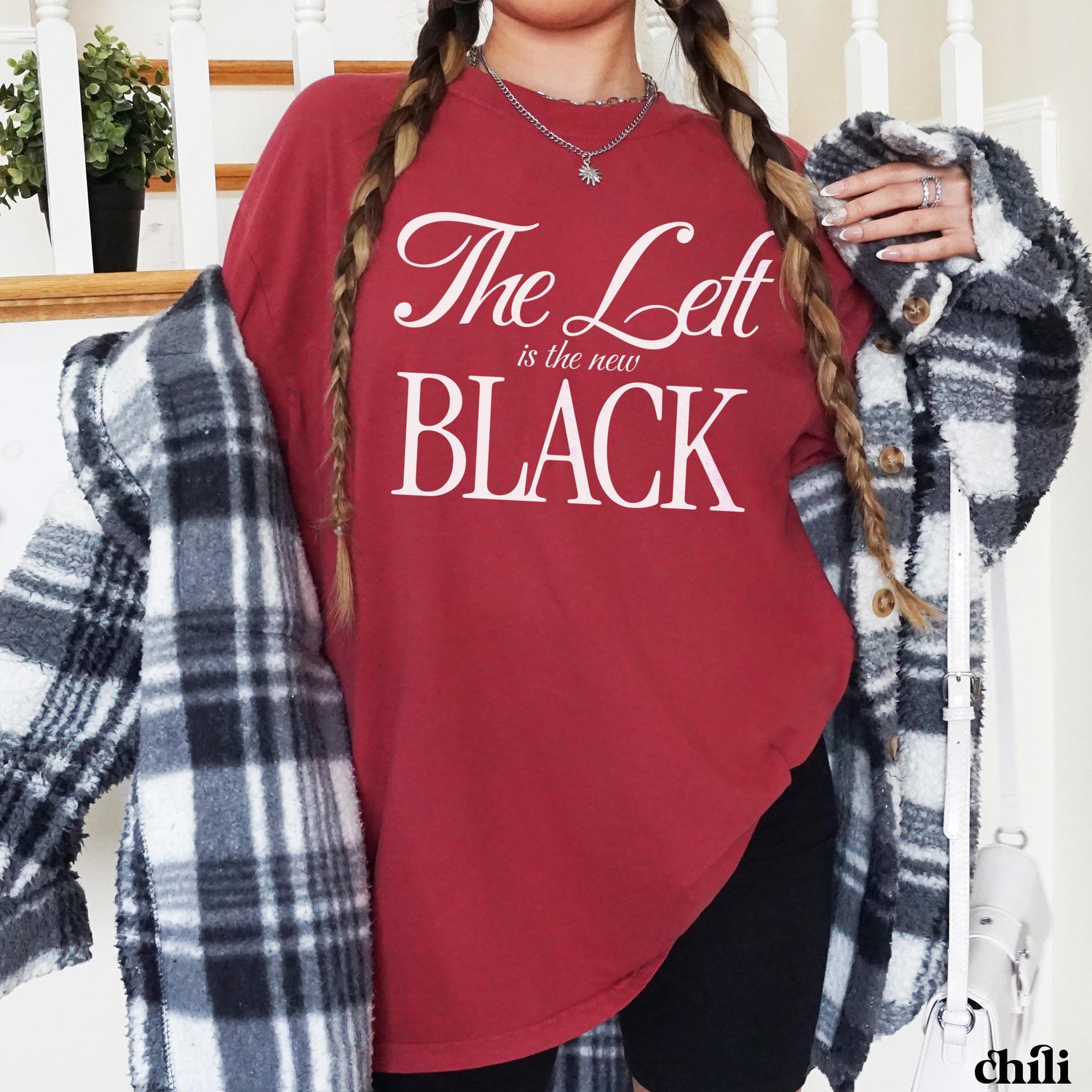 Crimson t-shirt with &amp;quot;The Left is the new BLACK&amp;quot; text, worn by a model with braids.