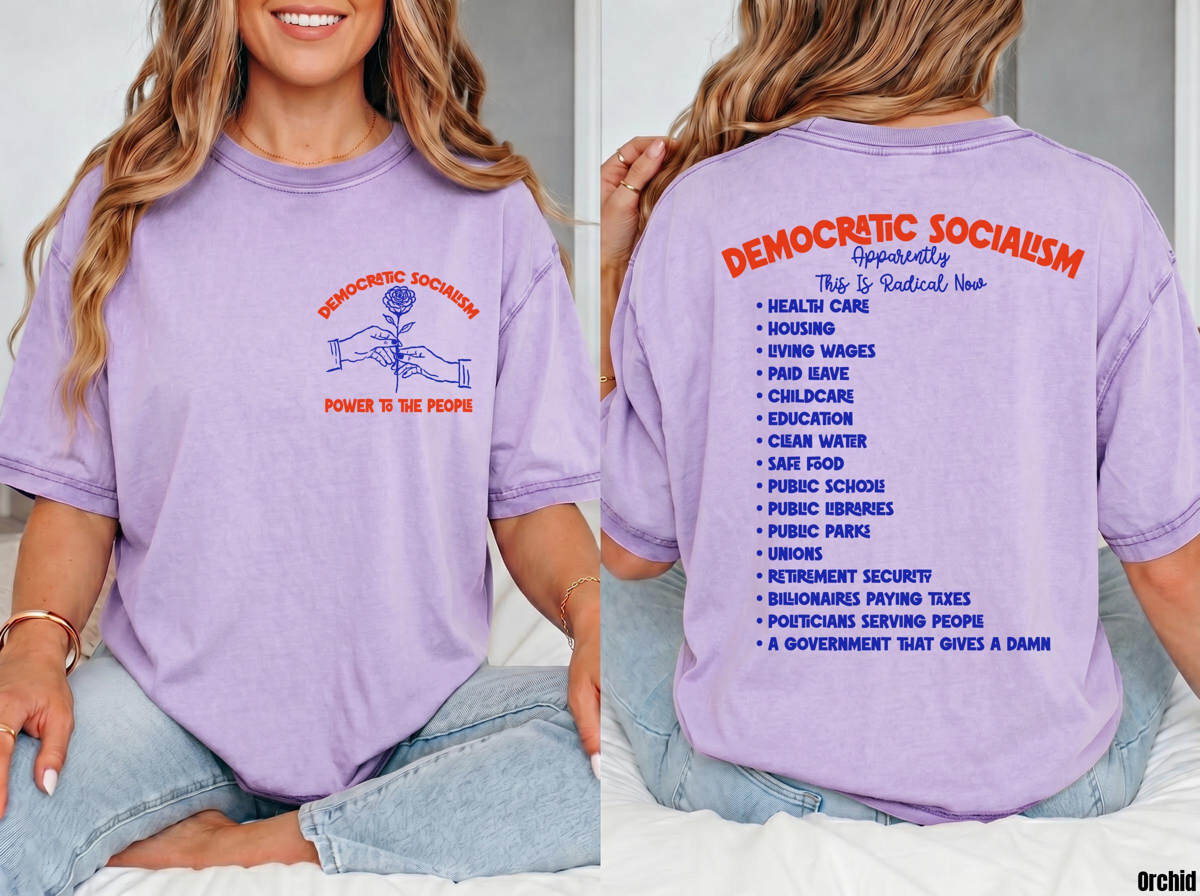 Lavender t-shirt with &amp;quot;Democratic Socialism&amp;quot; graphic and list of causes on back.