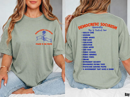 Sage green t-shirt with &amp;quot;Democratic Socialism&amp;quot; in blue and red text on front and back.